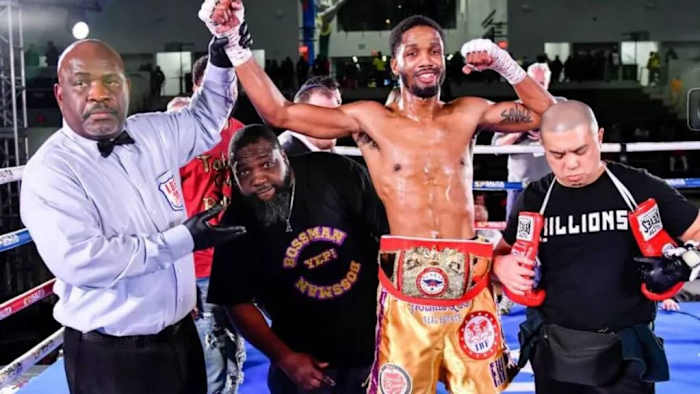 Ardreal Holmes Jr. celebrates his USBA super welterweight championship win over Marlon Harrington at the Wayne State Filed House in Detroit, Michigan. ADAM J. DEWEY/SALITA PTOMOTIONS.